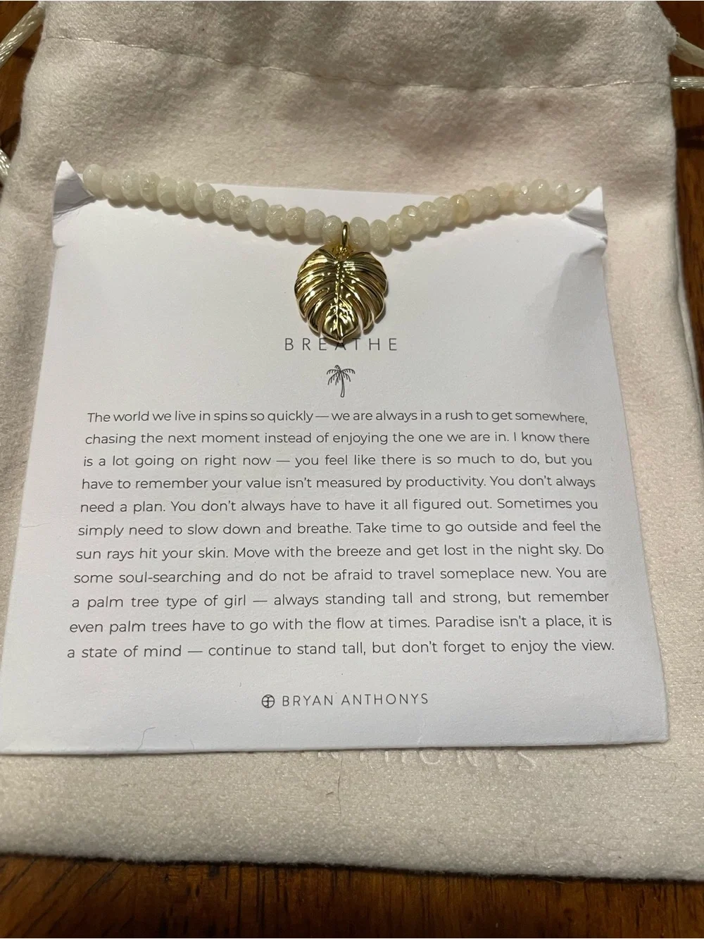Gold Monstera Leaf Pendant Necklace with Cream Beads